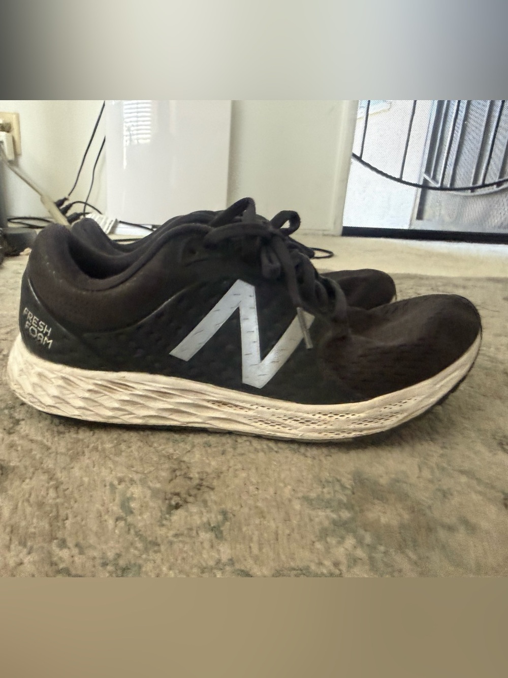 New Balance Women's Black Athletic Sneakers with White Logo
